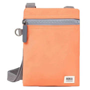 roka-chelsea-xs-recycled-nylon-pocket-sling-bag---firecracker-orange-34460788